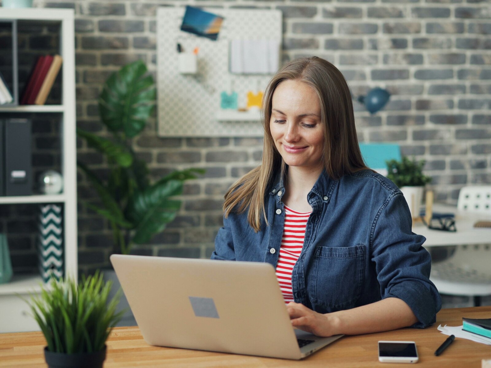 A registered manager working through admin at a desk